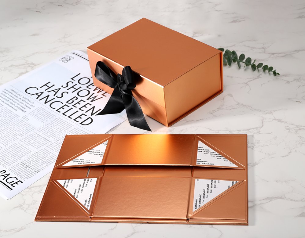 folding box with fixed ribbon