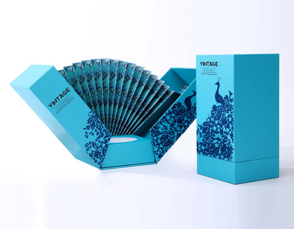 Blue fan presentation beside coordinated cartons